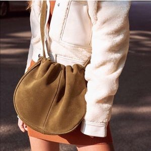 URBAN OUTFITTERS Suede Drawstring Bag